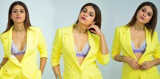 Shraddha Das in a yellow color dress choking the youth