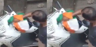 man cleans scooty with national flag video viral